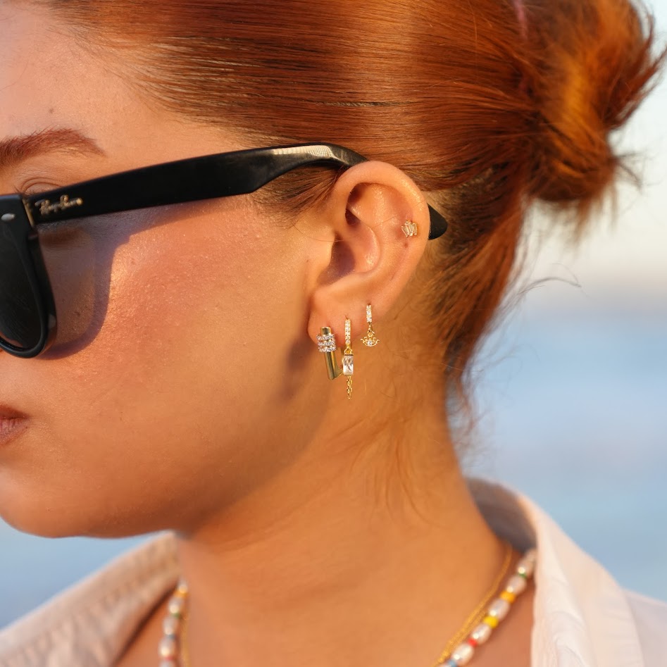 925 | Üç dizi taş küpe